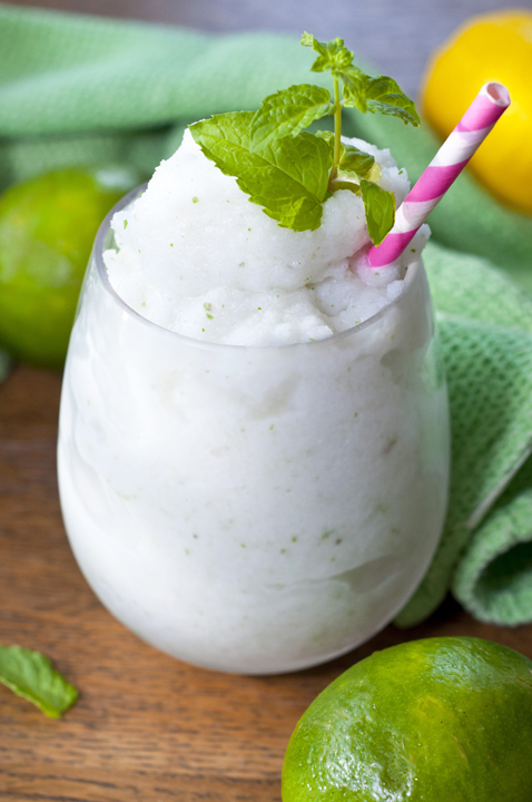 Frozen Coconut Mojito drink recipe, or "Cocojito", is an icy taste of summer that is laced with coconut and has the traditional lime and mint flavors we all love in a good Mojito!