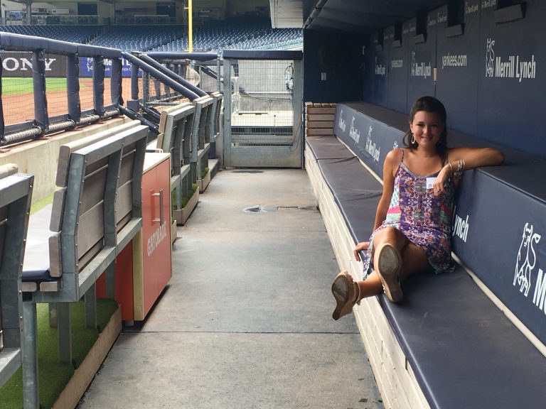 Private Tour of Yankee Stadium. My photo in the Yankee dugout.
