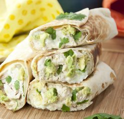 Chicken and Avocado Burritos recipe are stuffed with gooey melted cheese, Greek yogurt, juicy chicken, creamy avocado, and salsa verde for an easy weeknight, kid-approved dinner!