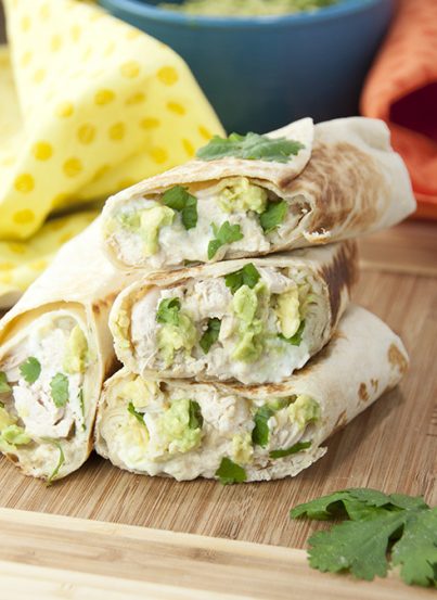 Chicken and Avocado Burritos recipe are stuffed with gooey melted cheese, Greek yogurt, juicy chicken, creamy avocado, and salsa verde for an easy weeknight, kid-approved dinner!