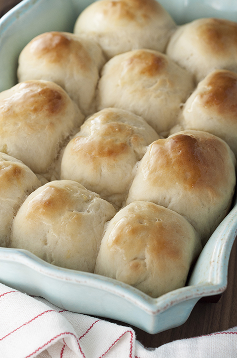 Fast and easy 30 Minute Homemade Dinner Rolls recipe perfect for a weeknight dinner or holiday meal! One smell of these amazing rolls, and you'll be counting down the minutes until you can take them out of the oven!