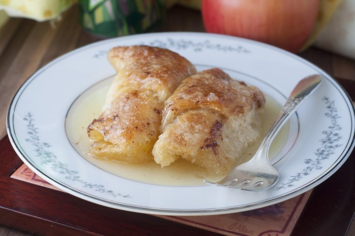 Easy Country Cinnamon Apple Dumplings for Thanksgiving or Christmas is a classic fall and holiday treat loaded with cinnamon and smothered in a buttery Mountain Dew sauce!