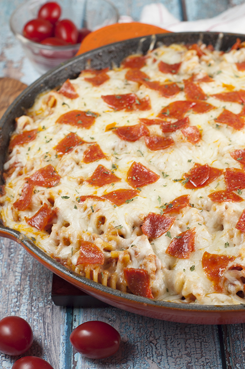 Easy One Pan Pizza Pasta Casserole is a family-friendly, crowd-pleasing dinner recipe that combines two favorites into one! It is all made in one pot for a comforting weeknight meal with hardly any clean up!
