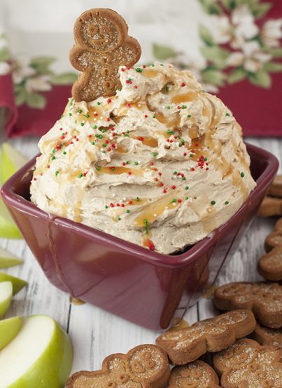 Make your holiday parties even sweeter with this easy Caramel Gingerbread Cheesecake Dip recipe that tastes like a creamy cheesecake in dip form with the special touch of gingerbread flavor! The caramel drizzle puts it over the top!