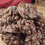 Crock Pot Triple Chocolate Peanut Candy dessert recipe is the easiest way to make homemade candy for the holidays! For this sweet and salty treat, just dump everything in the slow cooker and watch the magic happen!