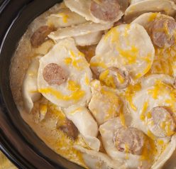 Crock Pot Sausage Pierogi Casserole recipe is a delicious and comforting dish made with chicken sausage and a creamy cheese sauce. Great for potlucks or a weeknight dinner that cooks right in the slow cooker!