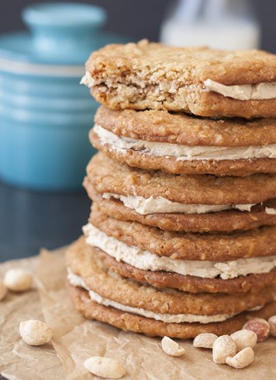 Why have store bought cookies when you can make this no-brainer, easy recipe for Homemade Stuffed Nutter Butter Cookies?! Chewy oatmeal peanut butter cookies with creamy, sweet peanut butter cream filling!