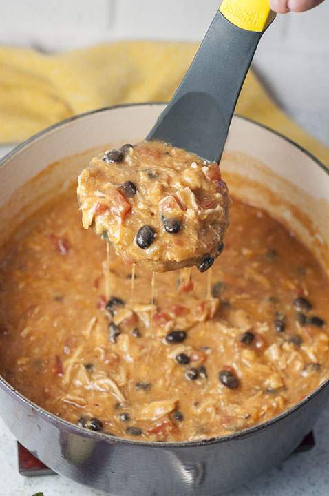 Flavorful and filling 20 Minute Cheesy Chicken Enchilada Soup recipe is super easy to cook up and full of the BEST flavors!