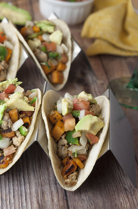Colorful and healthy sweet potato tacos recipe that is gluten free, vegetarian, and an easy meal for Mexican food or taco night. Add ground turkey for some protein!