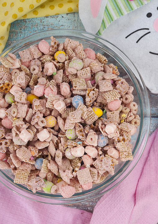 Easter Bunny Tail Chex Mix recipe loaded with peanut M&M's and chex is the cutest holiday Easter treat and so quick and easy that kids can help make it!
