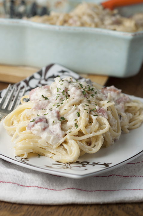 Creamy Baked Ham Fettuccine Alfredo is an easy to make comfort food pasta dish using leftover ham that will leave your family asking for seconds!