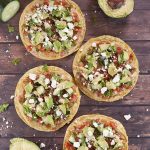 Pine Nut Hummus Pico de Gallo Tostadas recipe topped with an easy, fresh Pico de Gallo and a variety of toppings for a healthy, vegetarian appetizer or snack!
