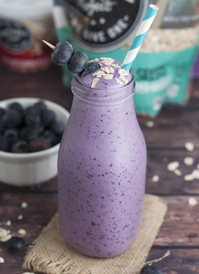 This creamy, healthy Blueberry Muffin Smoothie recipe has the delicious tastes of blueberry and oatmeal all in one healthy, wholesome breakfast smoothie!