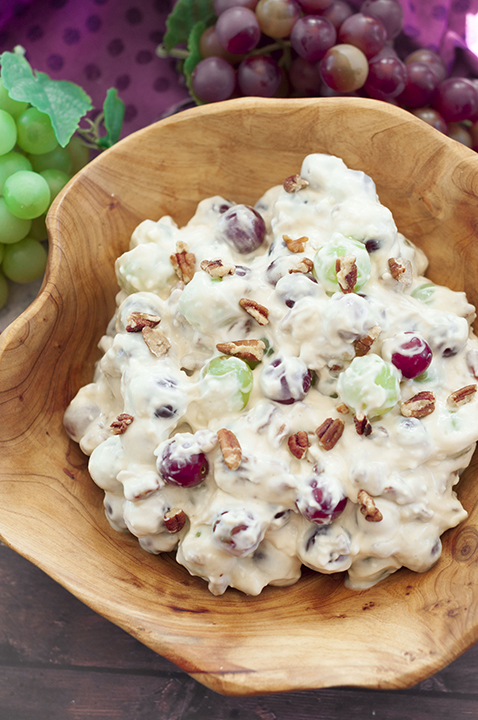 You're just 7 ingredients away from this Creamy Pecan Crunch Grape Salad recipe. It is guaranteed to be a huge hit at office potlucks, Memorial Day, BBQ's, holiday dinners and parties!