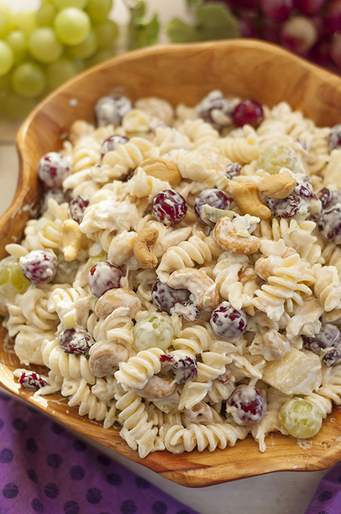 Creamy Cashew Chicken Rotini Salad loaded with chicken, cashews, fruit and veggies is my new favorite pasta salad to make for an awesome side dish! It can stand alone as a meal or bring it to a summer BBQ or potluck!