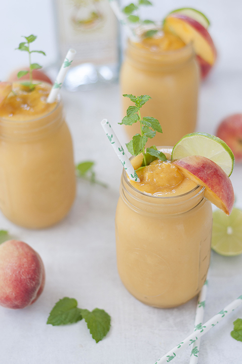 This Frozen Peach Mojito alcoholic drink recipe is the perfect frozen treat on a hot day or for any occasion! These beauties are refreshing, light, and so easy to make.