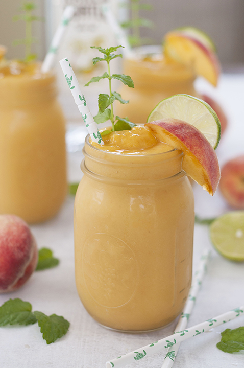 This Frozen Peach Mojito drink recipe is the perfect frozen treat on a hot day or for any occasion! These beauties are refreshing, light, and so easy to make.