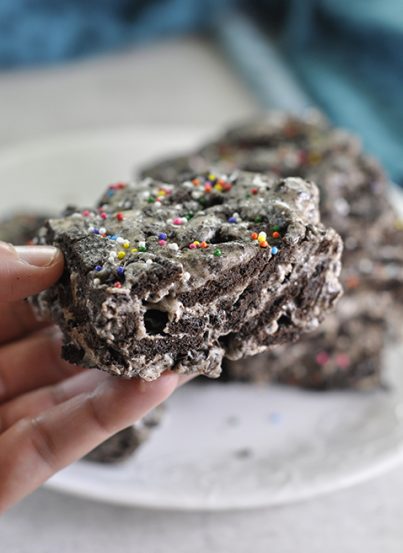 Gooey Oreo Krispie Treats dessert recipe, or "Cookies and Cream Bars", is your favorite childhood treat loaded with chunks of Oreo and only 3 ingredients!