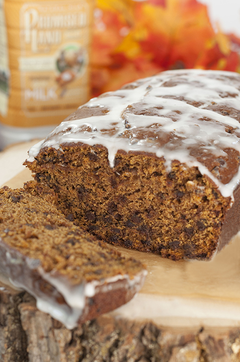 Bourban-Glazed Chocolate Chip Pumpkin Bread recipe where cinnamon and fall spices blend with chocolate and pumpkin flavors to make the most tender, moist holiday quick bread you'll ever make!