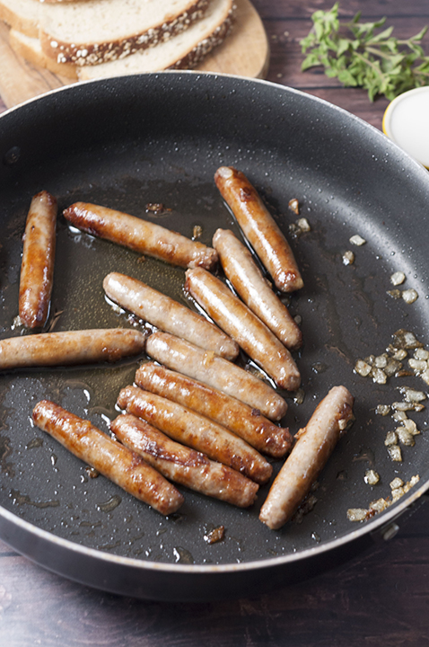 Using a non-stick skillet to brown the pork sausage for the sausage, egg, and cheese scramble. 