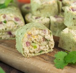 Your party guests will love this recipe for Avocado Chicken Salad Pinwheels. Creamy chicken salad rolled up in tortillas for a healthy game day appetizer or  lunch/dinner for your whole family!