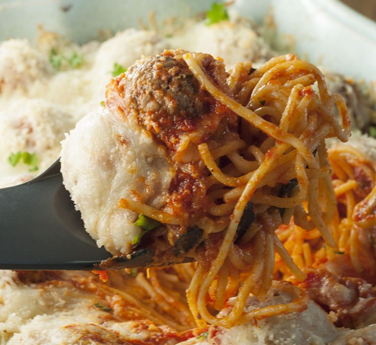 Italian Baked Spaghetti and Meatballs Casserole is a delicious change from your everyday Sunday sauce. This will be a new family favorite comfort food recipe!