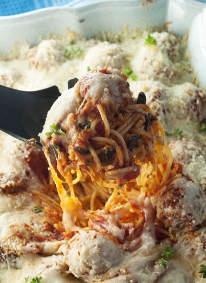 Italian Baked Spaghetti and Meatballs Casserole is a delicious change from your everyday pasta and sauce. This will be a new family favorite comfort food recipe!