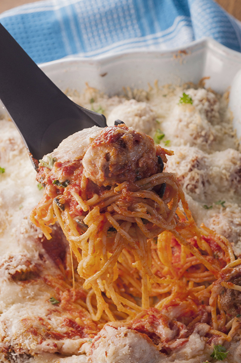 Italian Baked Spaghetti and Meatballs Casserole is a delicious change from your everyday Sunday pasta and sauce. This will be a new family favorite comfort food recipe and it's great for the holidays!