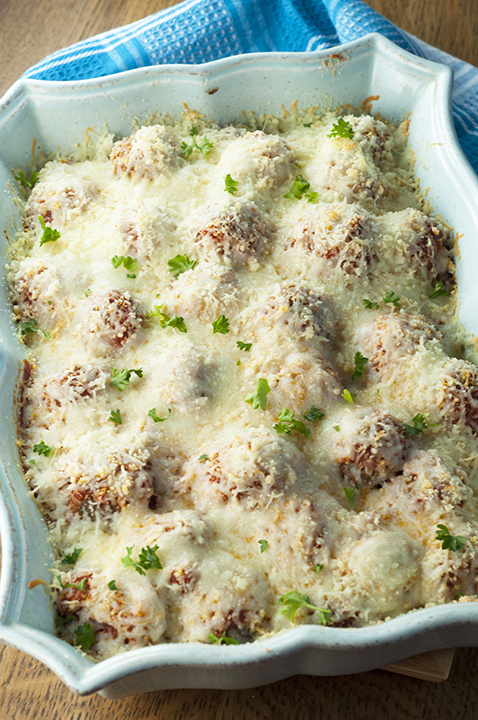Italian Baked Spaghetti and Meatballs Casserole is a delicious change from your everyday pasta and sauce. This will be a new family favorite Italian comfort food recipe!