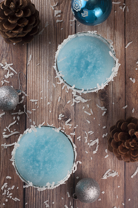 Blue Christmas Coconut Cocktail recipe is the best Christmas alcoholic drink and is sure to put a smile on everyone's faces! This is perfect for serving at a party and you can make a large batch!