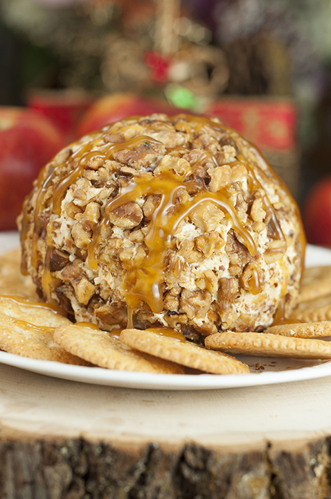 Quick and easy Caramel Apple Cheese Ball recipe works for a holiday appetizer idea, snack OR fall dessert! This sweet and salty treat would be perfect for a, office potluck or New Year's Eve party. 