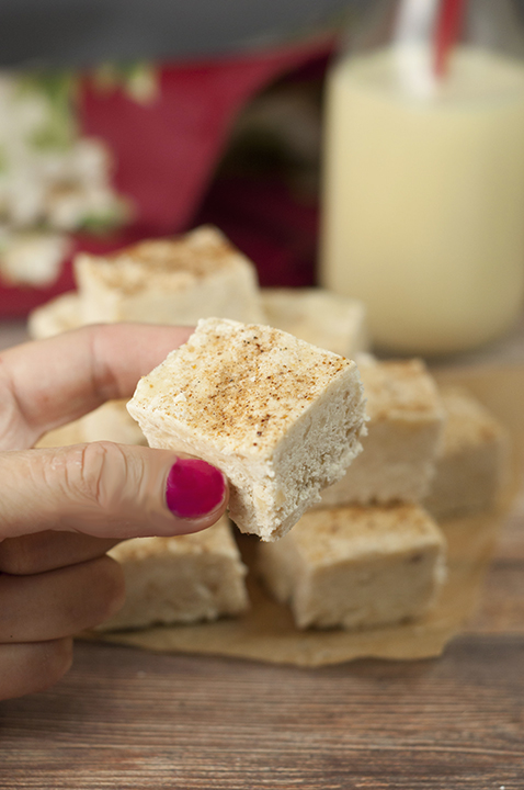 This Smooth and Creamy Christmas Holiday Eggnog Fudge recipe is your favorite holiday beverage turned into the perfect Christmas dessert for your holiday parties! You'll love the slight kick of nutmeg on top!