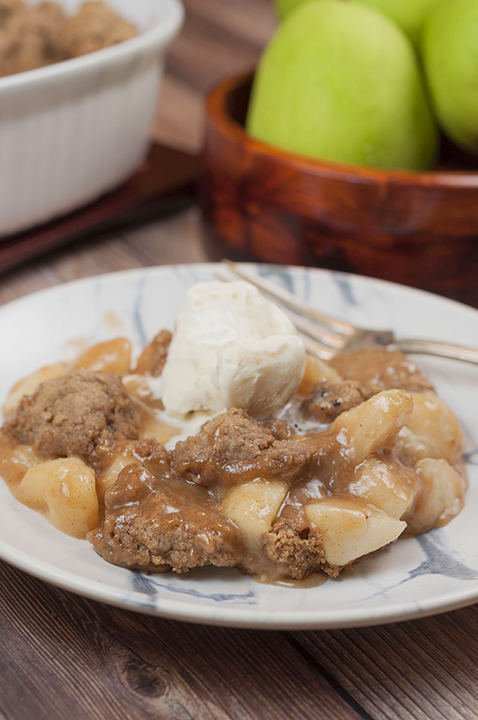 Easy Fall Holiday-Spiced Pear Cobbler recipe made with fresh pears has all of the fall/winter spices to make this the perfect, decadent holiday dessert idea!