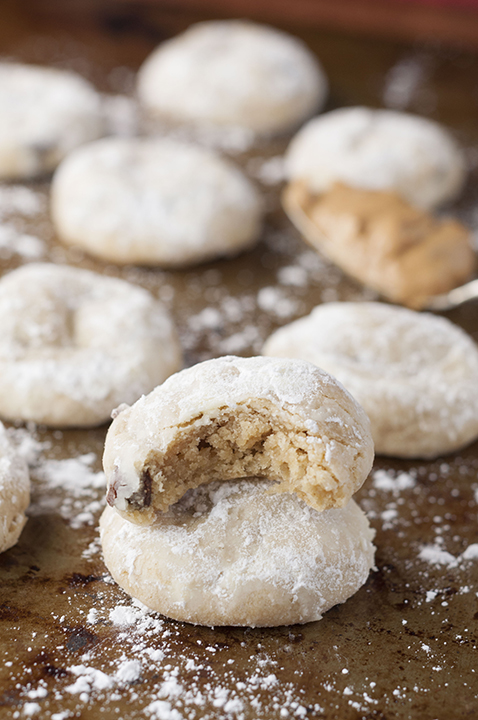 Peanut Butter Chocolate Soft & Chewy Crinkle Cookies recipe packed with peanut butter and chocolate chips are your new favorite holiday Christmas cookie to add to your dessert trays!