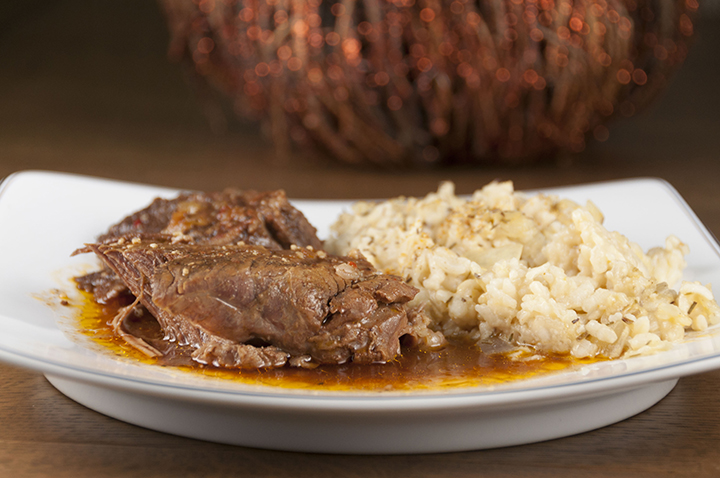 Tender, fall-apart, juicy Slow Cooker Italian Pot Roast recipe is packed with flavor and an easy weeknight mealr. It's fancy enough to serve to dinner guests for a dinner party or Christmas dinner and the crock pot does all the cooking for you!