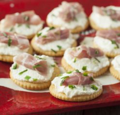 Whipped Ricotta Prosciutto Cracker Bites are the perfect Christmas appetizer recipe or New Year's Eve appetizer that comes together in no time at all and is so easy to make!