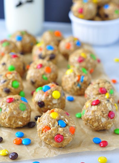 No-Bake Monster Cookie Dough Energy Bites are a gluten-free recipe suitable for a snack or dessert that will satisfy your sweet tooth without being loaded with sugar!