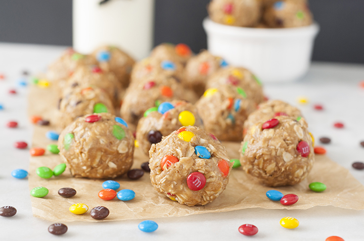 Healthy No-Bake Monster Cookie Dough Energy Bites are a gluten-free recipe suitable for a snack or dessert that will satisfy your sweet tooth without being loaded with sugar!