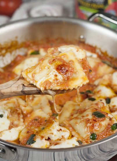 This easy Ravioli al Pomodoro recipe is an easy Italian one skillet meal made with San Marzano tomatoes, fresh mozzarella cheese, and absolutely packed with flavor!