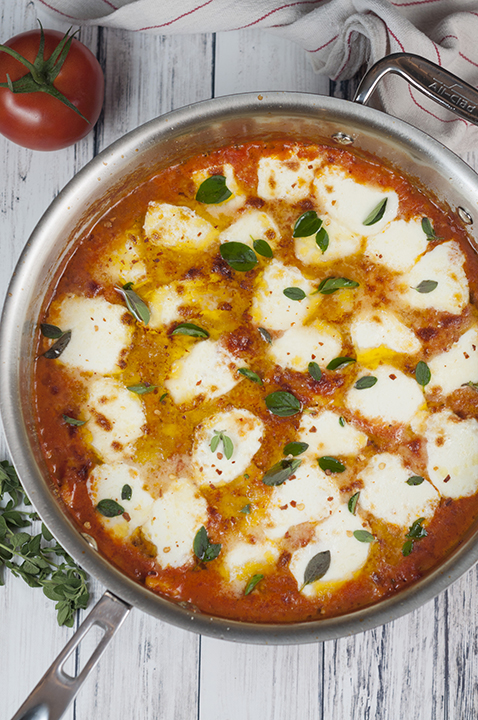 This Ravioli al Pomodoro recipe is an easy Italian one skillet meal made with San Marzano tomatoes, fresh mozzarella cheese, and absolutely packed with flavor!