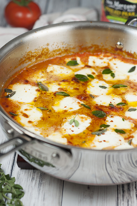 This Ravioli al Pomodoro recipe is an easy Italian one skillet meal made with San Marzano tomatoes, fresh mozzarella cheese, and absolutely packed with flavor! This dinner is restaurant-quality!