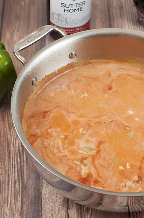 Preparing the cream sauce for the spicy chicken riggies recipe.