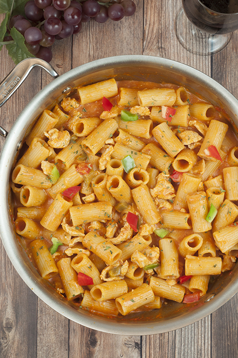 This simple Spicy Chicken Riggies recipe is one of my favorite Italian pasta dishes with the perfect amount of kick to it in a creamy tomato sauce. The whole family will love this for a weeknight meal or special occasion!