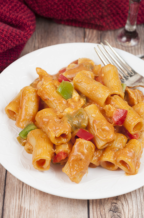 This simple Spicy Chicken Riggies recipe is one of my favorite Italian pasta dishes with the perfect amount of kick to it in a creamy tomato sauce. The whole family will love this for a weeknight meal, dinner party, or a date night in!