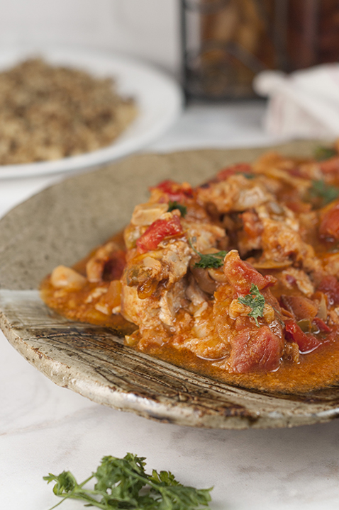 This hearty Chicken Cacciatore is so easy to make and the rich, thick tomato broth is delicious. We love it served over pasta or with a side of rice and it's the perfect choice for Italian night dinner!