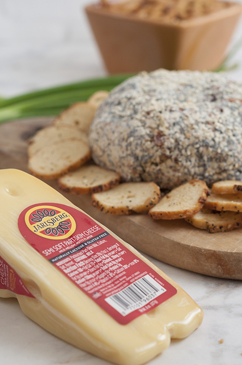 Get the holiday party started with this Everything Bagel Cheese Ball recipe: all the flavors of your favorite everything bagel turned into a delicious cheese ball appetizer! Serve it with bagel chips and watch it disappear.