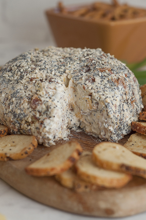 Get the party started with this Everything Bagel Cheese Ball recipe: all the flavors of your favorite everything bagel turned into a delicious cheese ball appetizer! Serve it with bagel chips and watch it disappear.