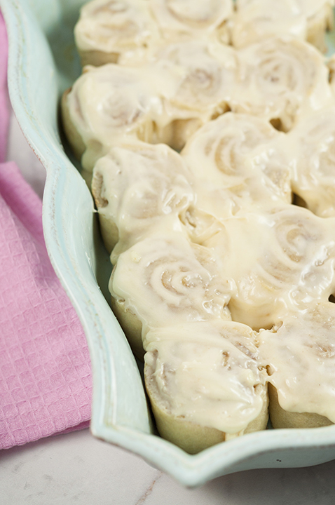 Copycat Homemade One Hour Cinnabon Cinnamon Rolls smothered in cream cheese frosting are the perfect recipe for an easy Easter morning brunch or breakfast, Christmas morning breakfast, or any weekend/holiday you make an extra special and easy breakfast for the family. They taste just like the famous Cinnabon bakery in the mall!
