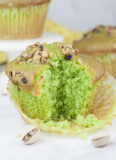 Easy, moist Green Walnut Pistachio Muffins recipe that is great for St. Patrick's day breakfast, dessert, or Easter brunch idea! You'll love that special crunch from the nuts on top!