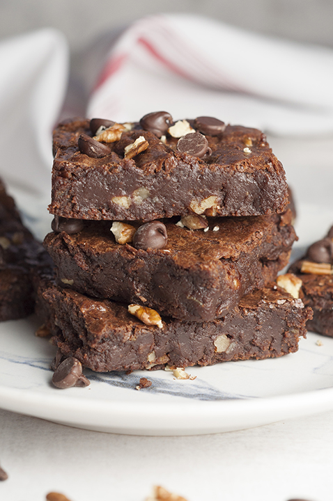 This homemade recipe for rich, Gooey Perfect-Every-Time Brownies with pecans is my new go-to easy brownie recipe. These brownies are adaptable to any add-ins you choose and will be your new favorite brownie recipe.